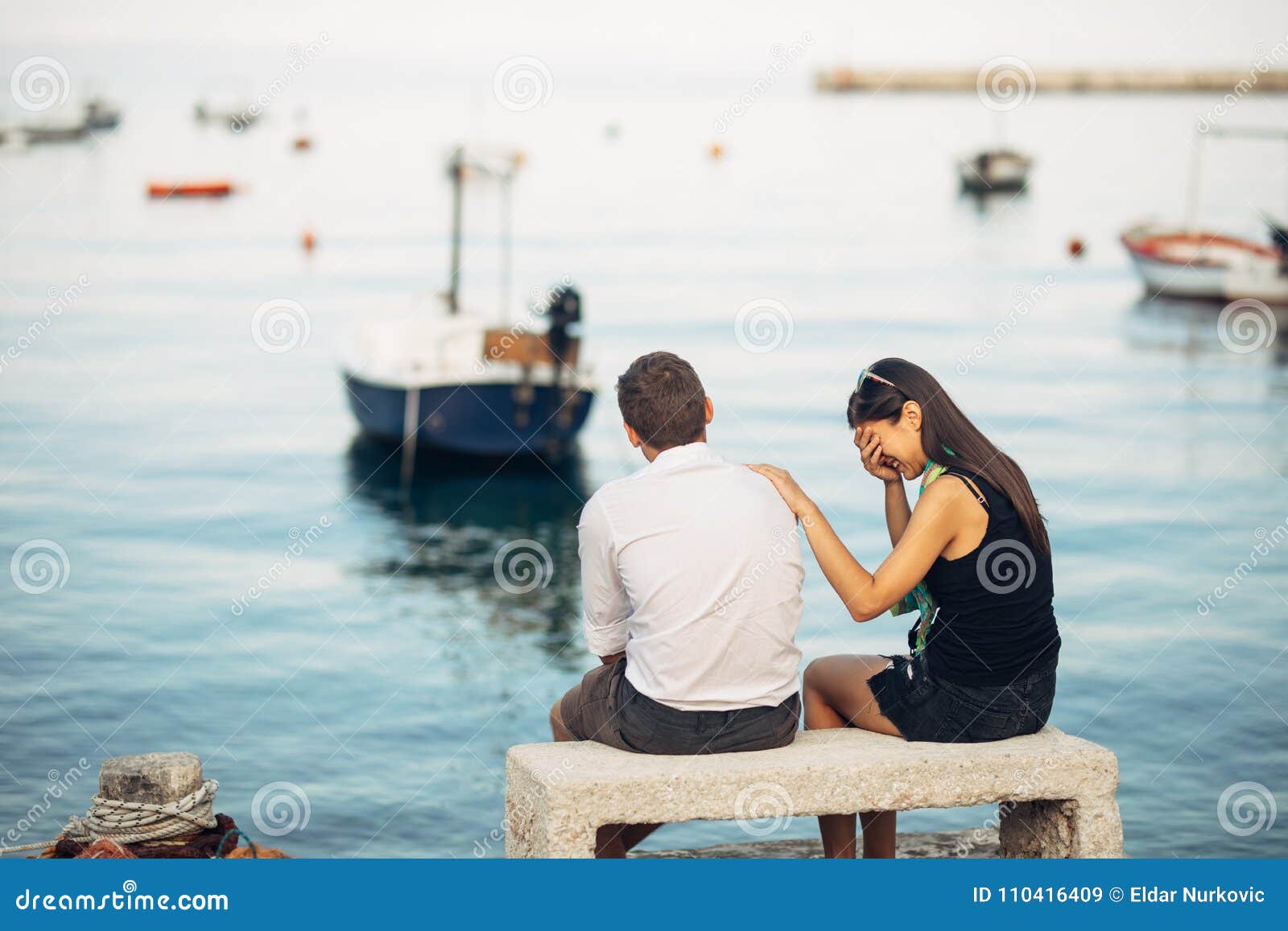romantic couple having relationship problems.woman crying and begging a man.fisherman life,dangerous occupation.navy sailors
