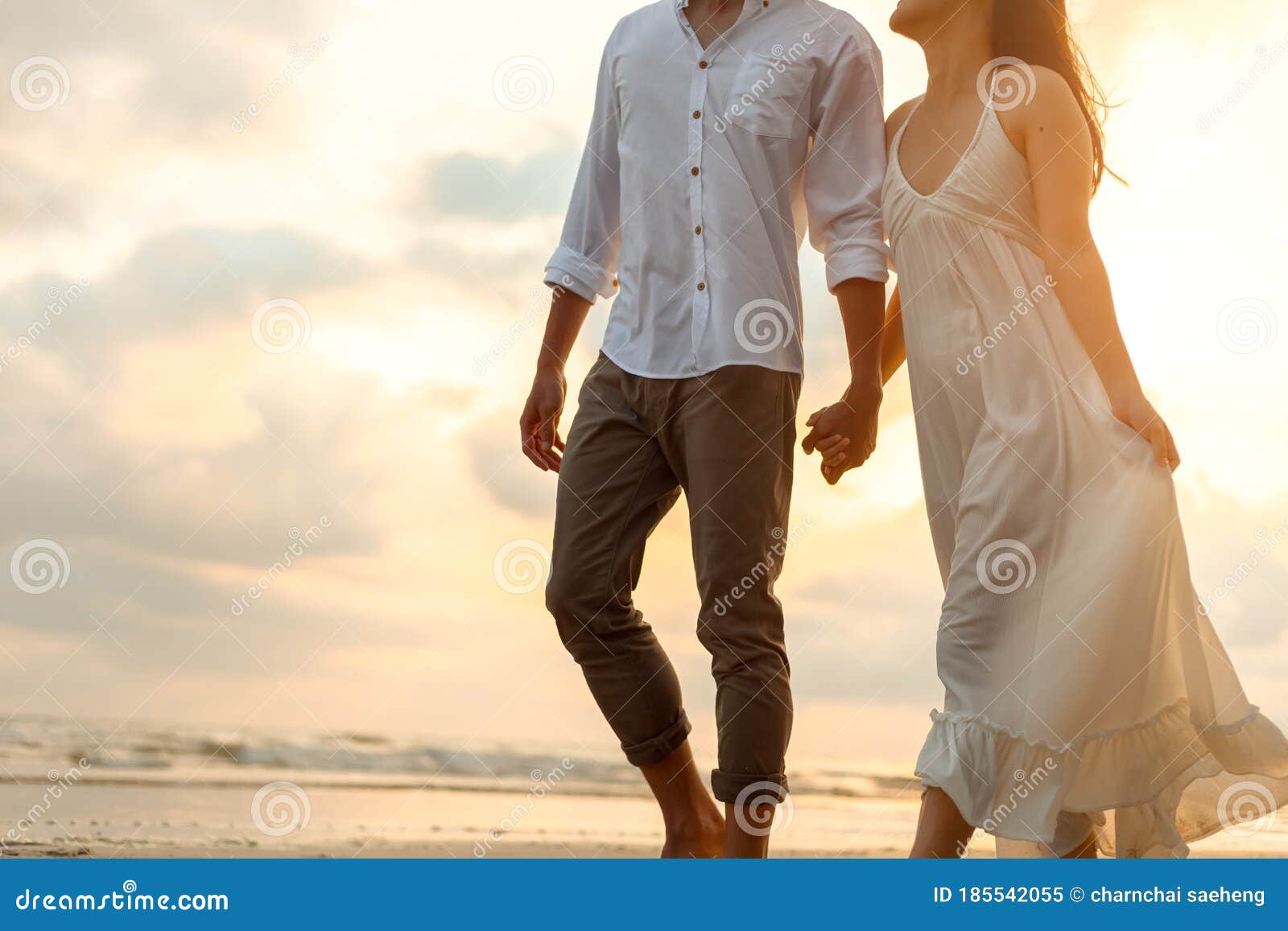 Romantic Couple Holding Hands and Walking on Beach. Man and Woman ...