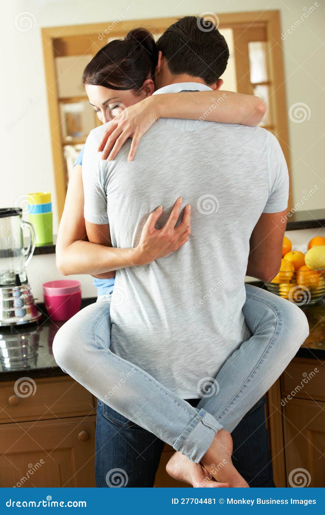 Romantic Couple Hugging in Kitchen Stock Image - Image of sitting ...