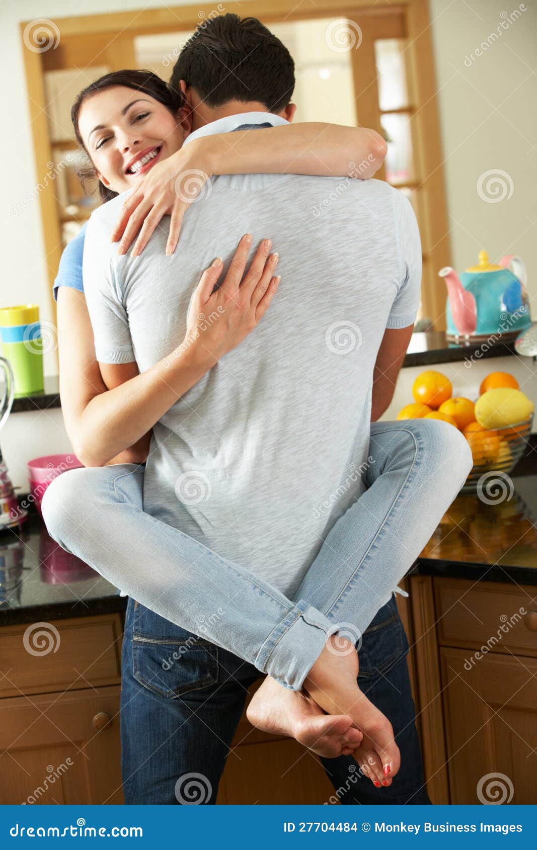 Romantic Couple Hugging in Kitchen Stock Photo - Image of female ...