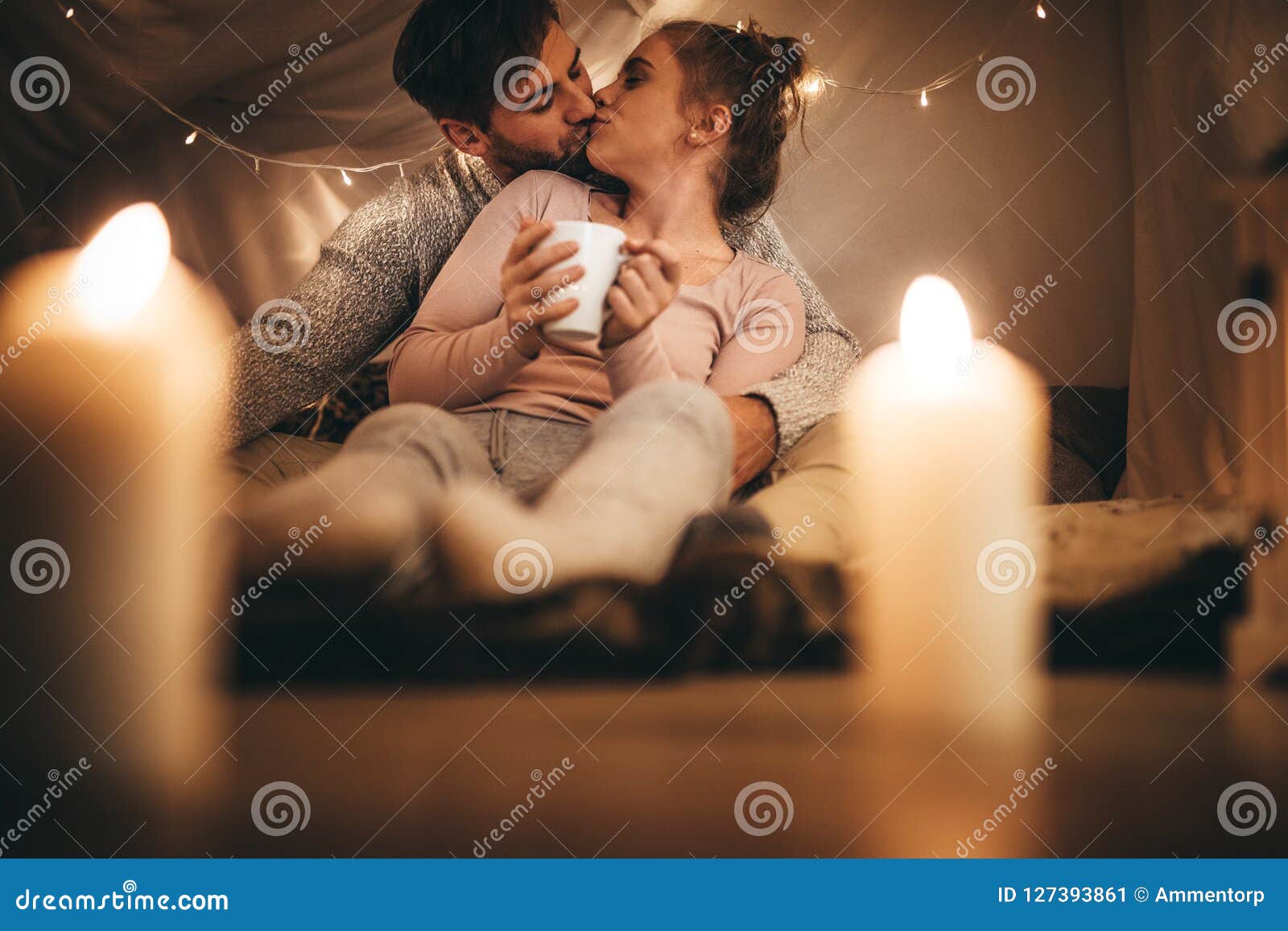 Romantic Couple Kissing Each Other Sitting on Bed Stock Image ...