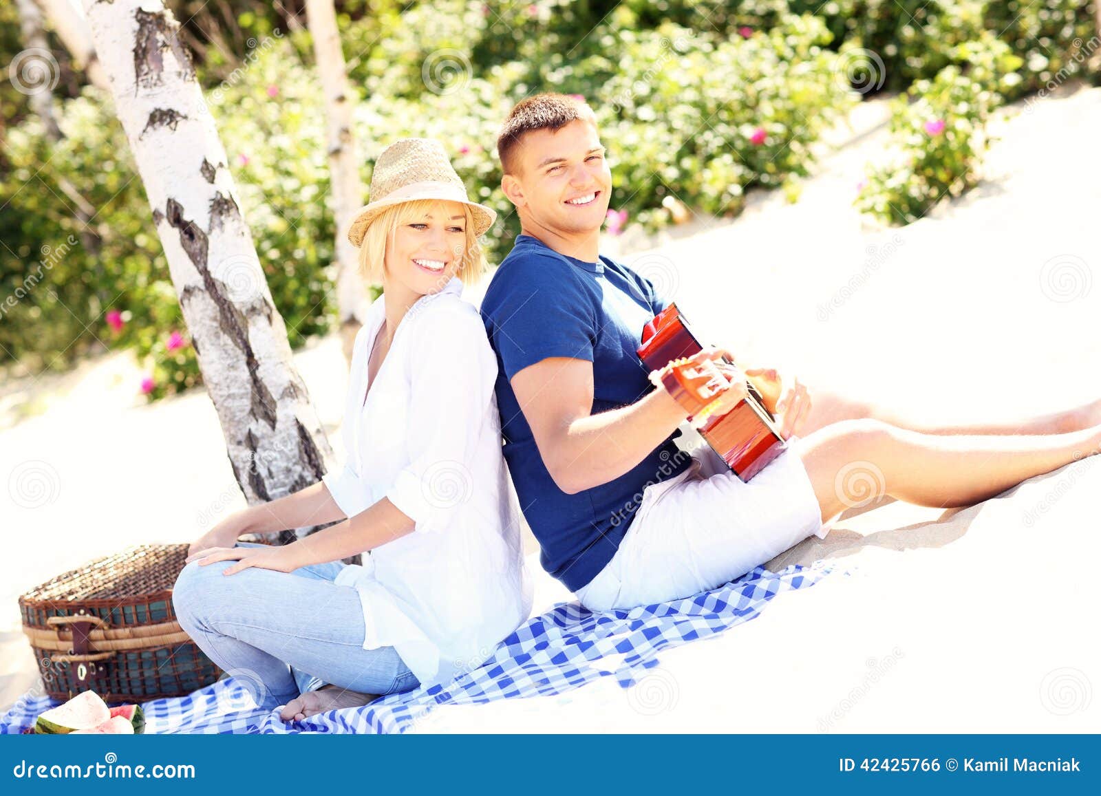 Romantic Couple  Playing Guitar  At The Beach Stock Photo 