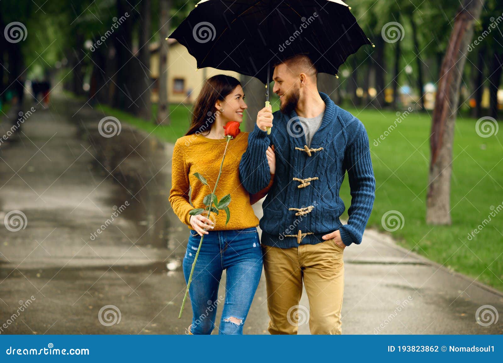 Romantic Couple with Umbrella Walking in Park Stock Photo - Image ...