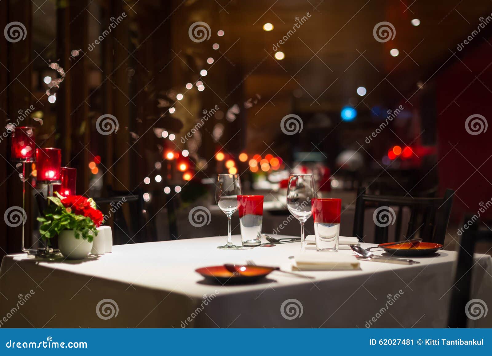 Romantic Dinner Setup, Red Decoration with Candle Light in a Res Stock