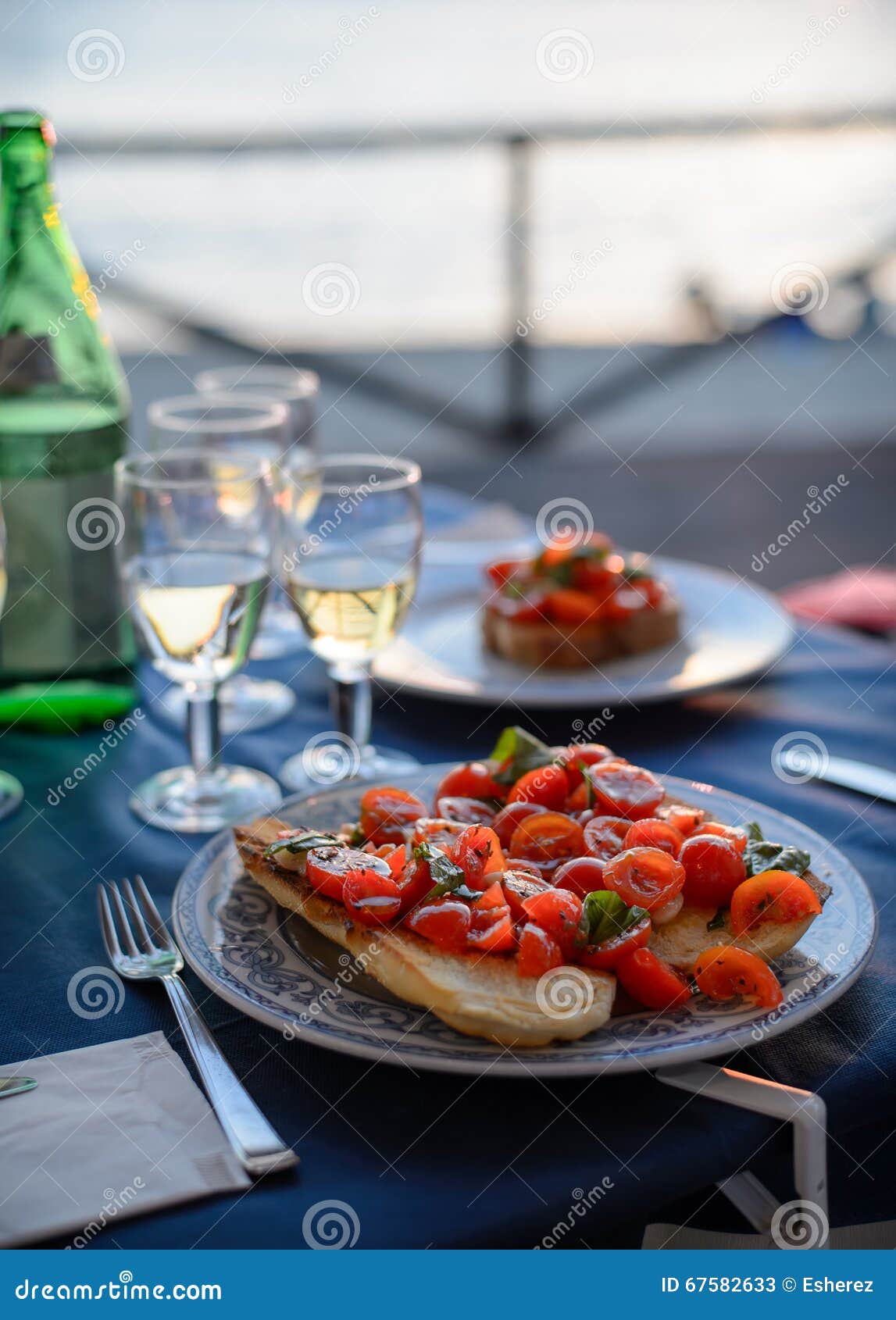 Romantic Dinner at Sunset on the Sea. Stock Image - Image of restaurant