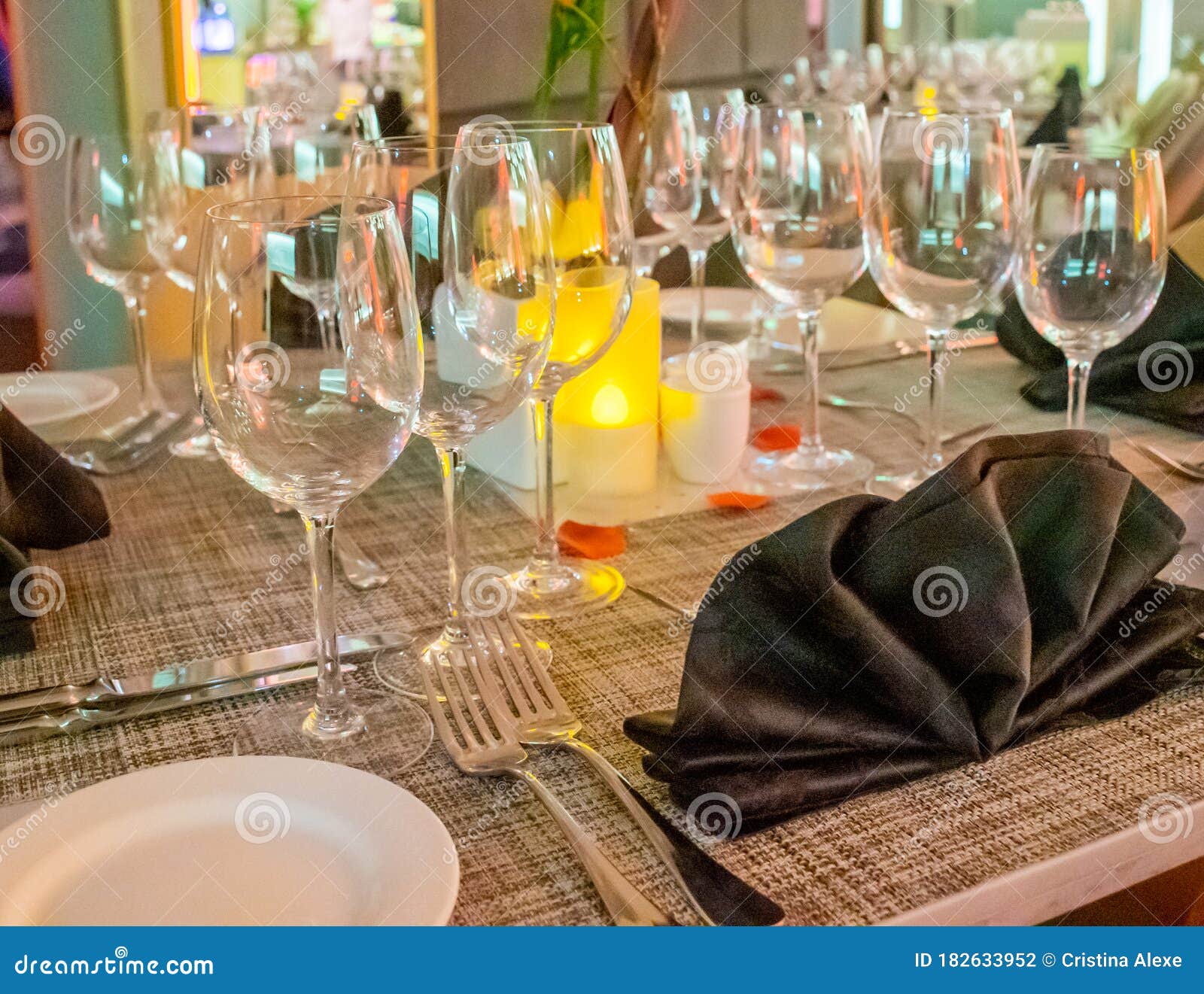 Romantic Dinner Table Setup Decoration with Candle Light in a