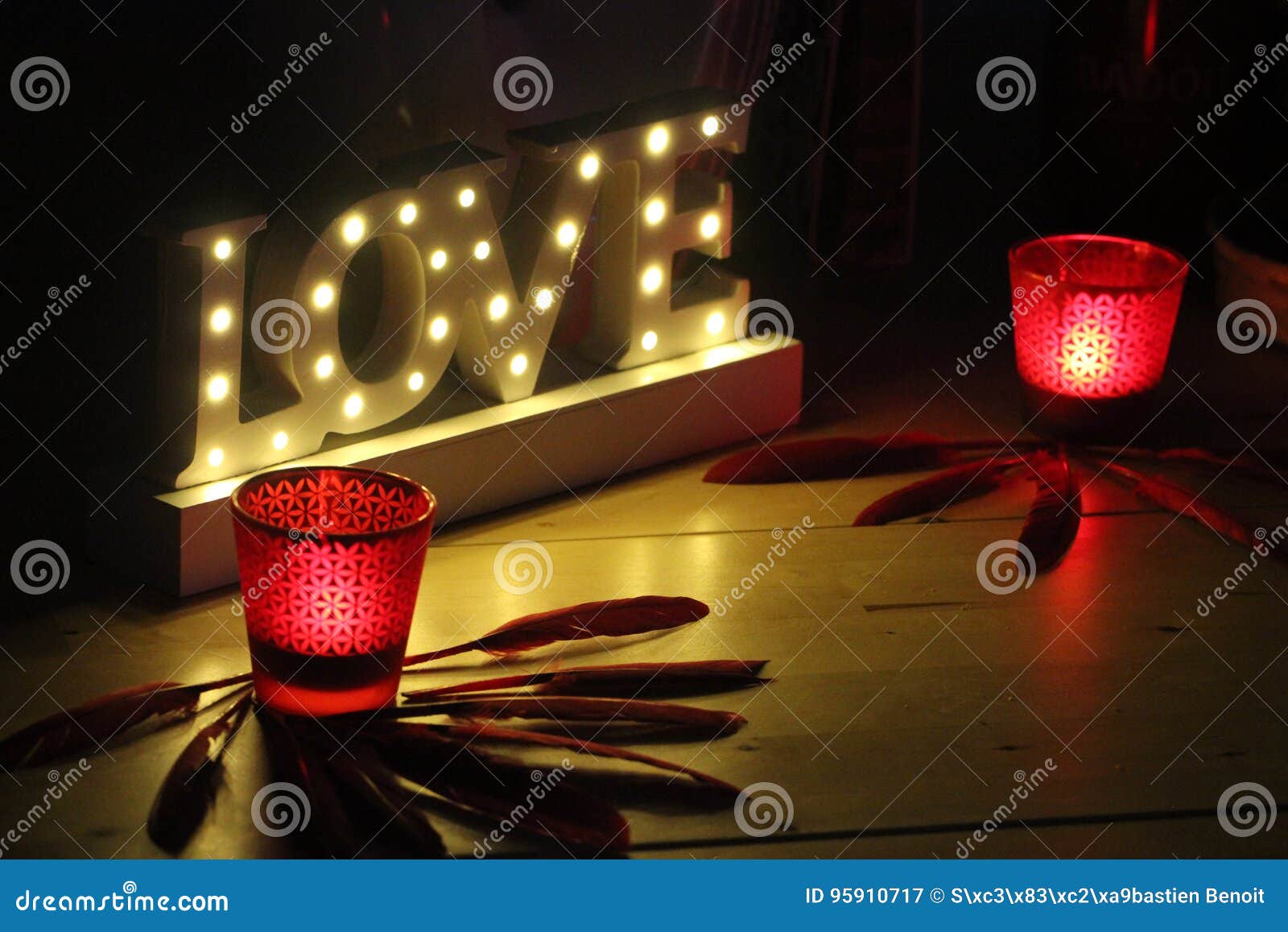 romantic image with candles and the word love bright