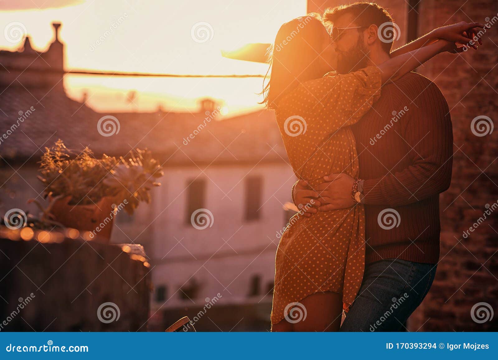 romantic kiss at  beautiful sunset.young couple in love