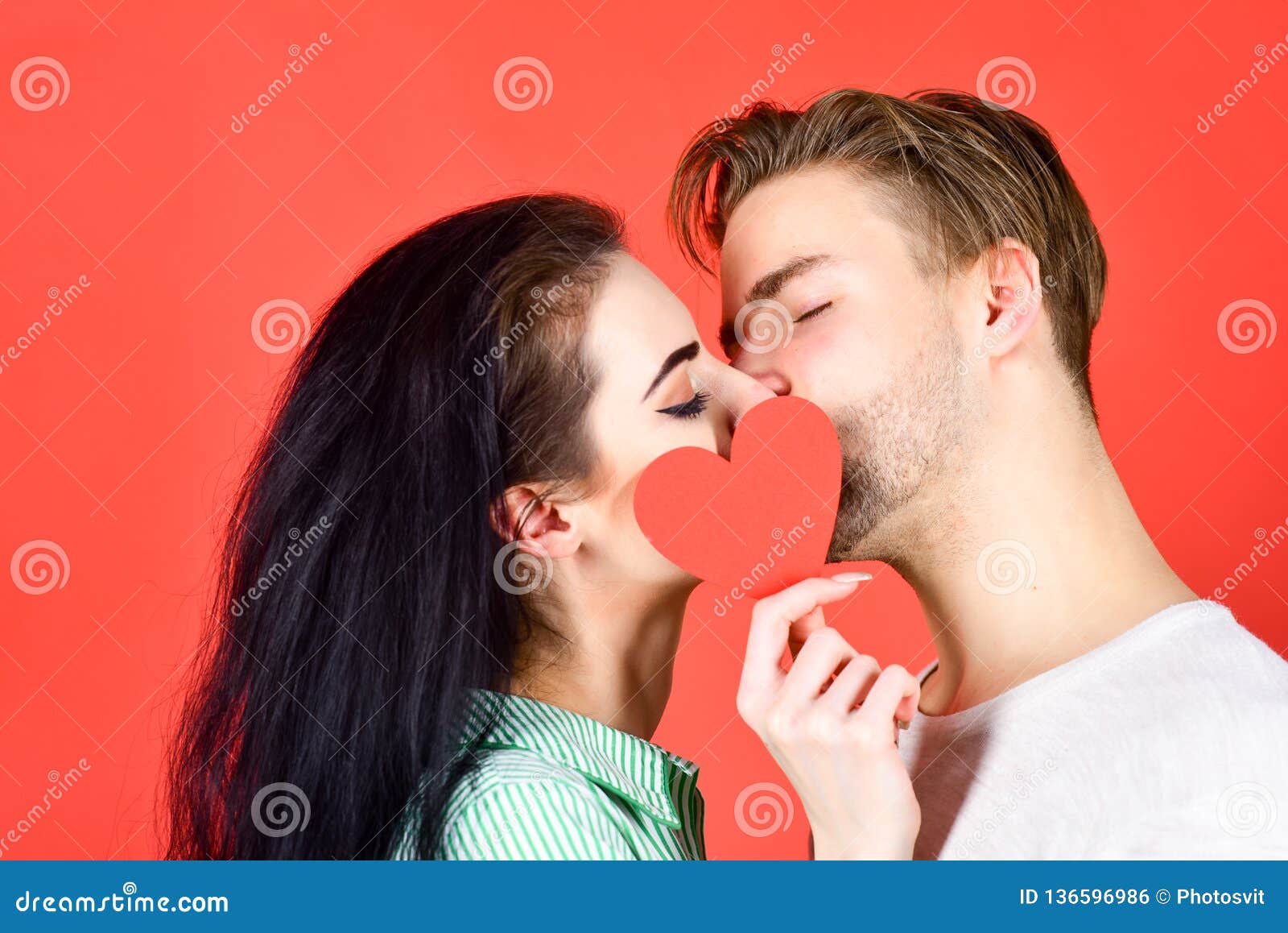 Romantic Kiss Concept. Couple in Love Kissing and Hide Lips Behind ...