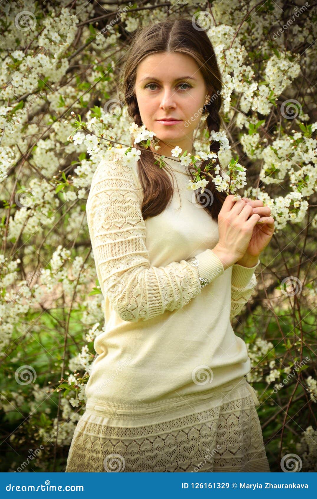 The Romantic Portrait of the Girl in the Blooming Cherry Trees. Stock ...