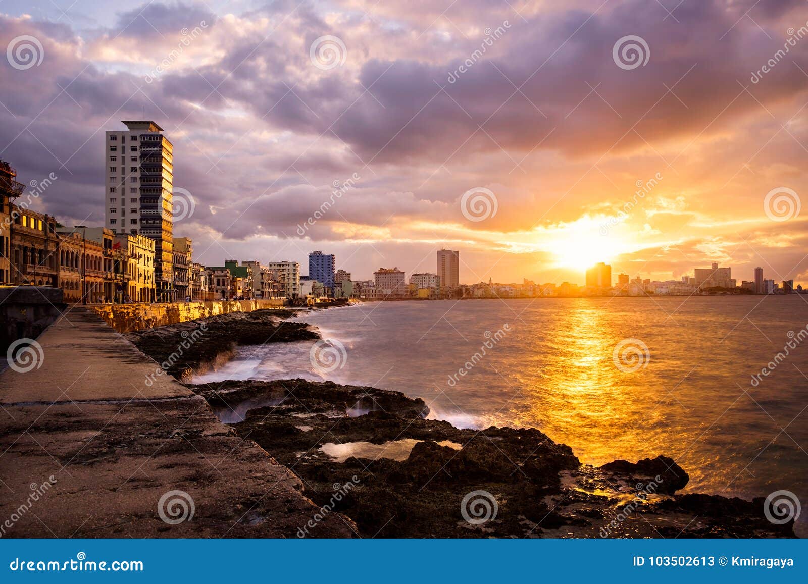 romantic sunset at the malecon seawall in havana
