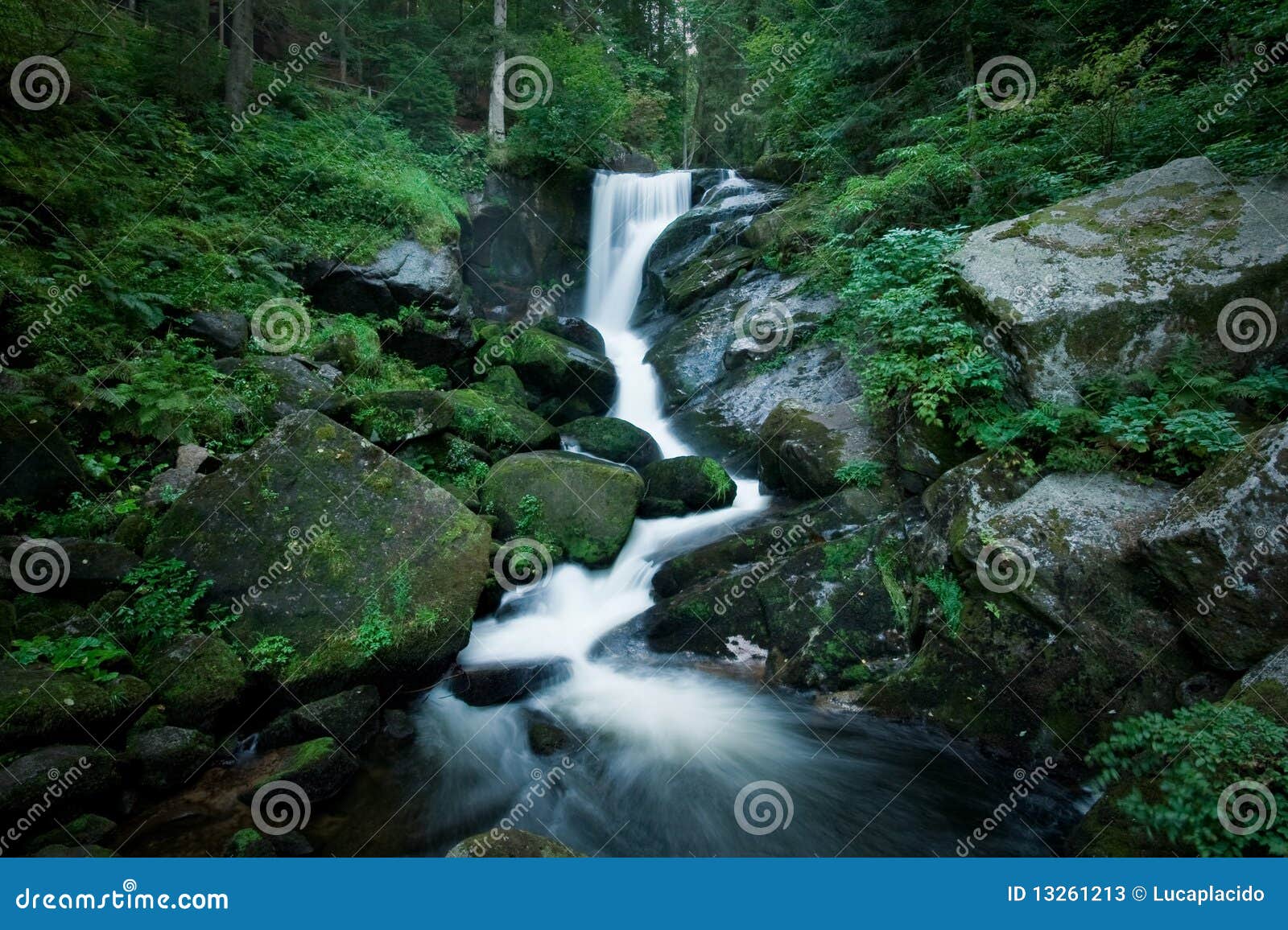 romantic waterfall inside the forrest