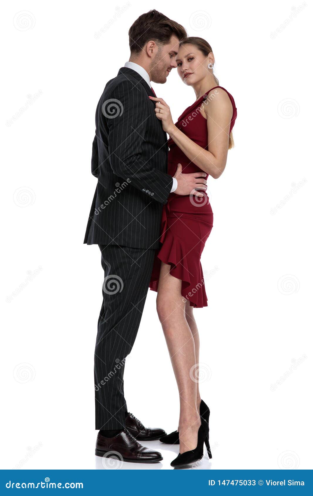 Romantic Young Guy Holding His Girlfriend by the Hips Stock Image ...