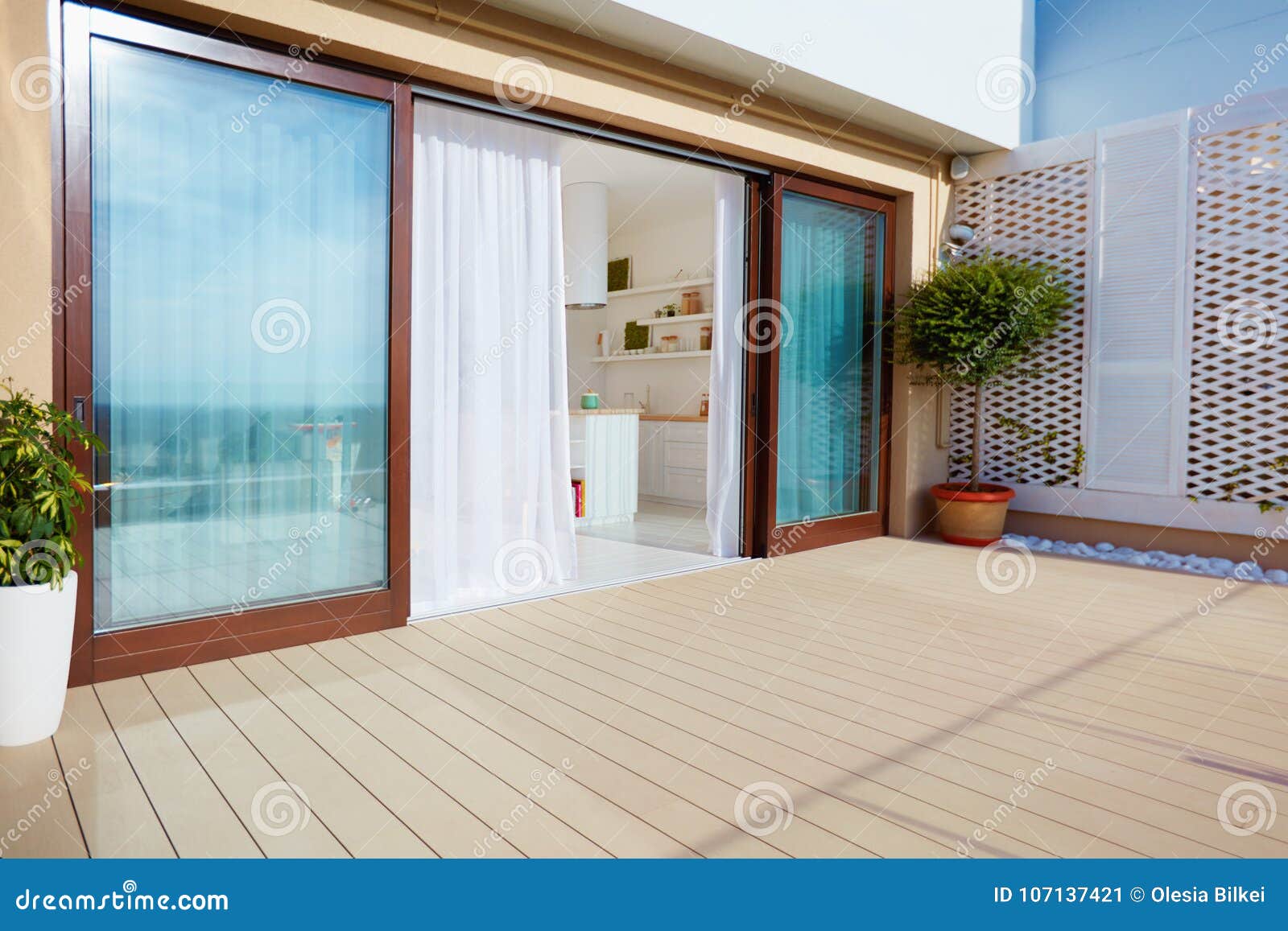 Roof Top Patio With Open Space Kitchen Sliding Doors And Decking