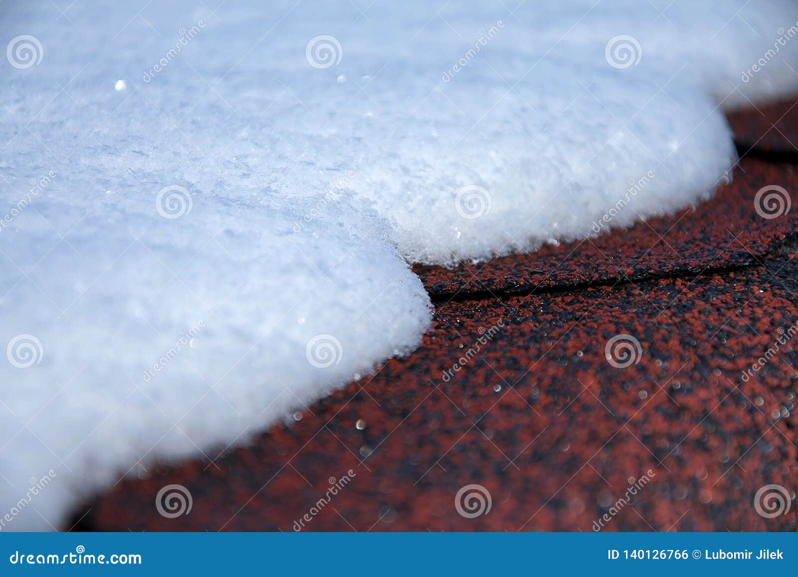 Roof in Winter. Roof with Asphalt Shingles Covered with Snow Stock
