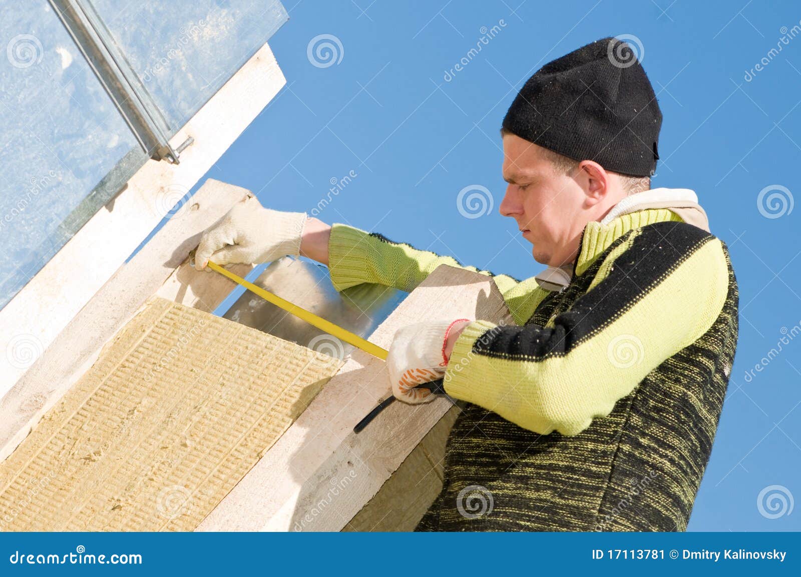 Roofer with measure tape stock image. Image of construction 17113781