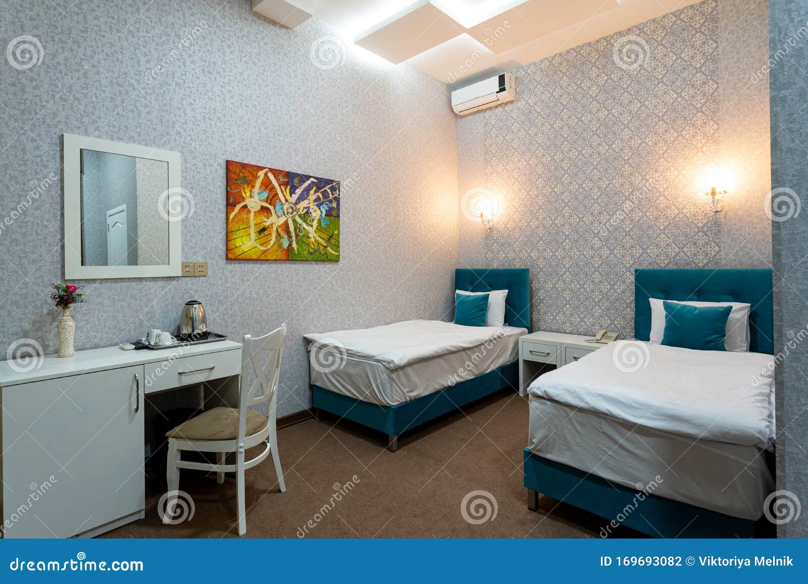 A Room With A Double Bed A White Nightstand A Table And Chair Under Mirror Editorial Photography Image Of Living Comfort 169693082