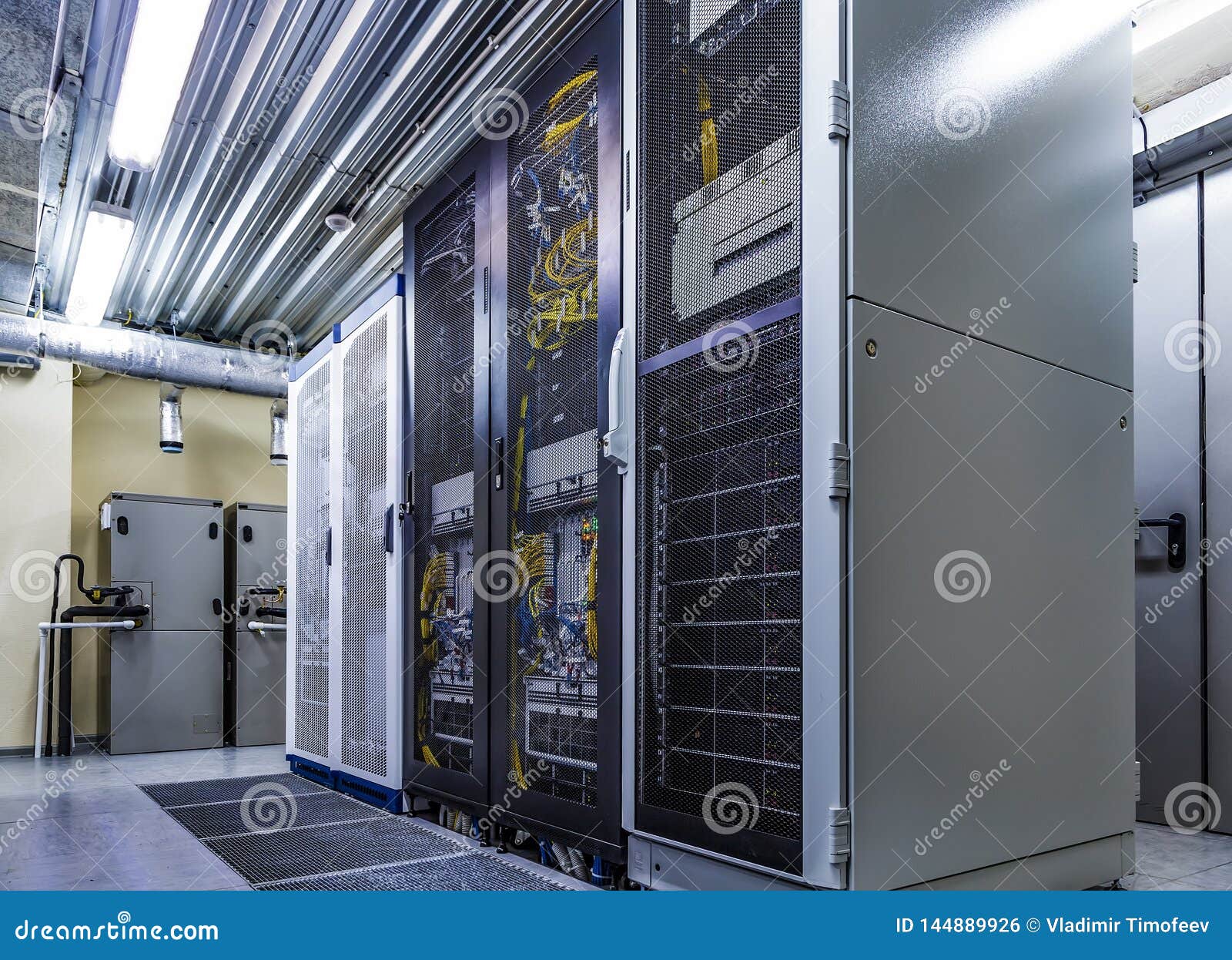 Room With Server Rack Of Hardware Cloud Storage In Big Data