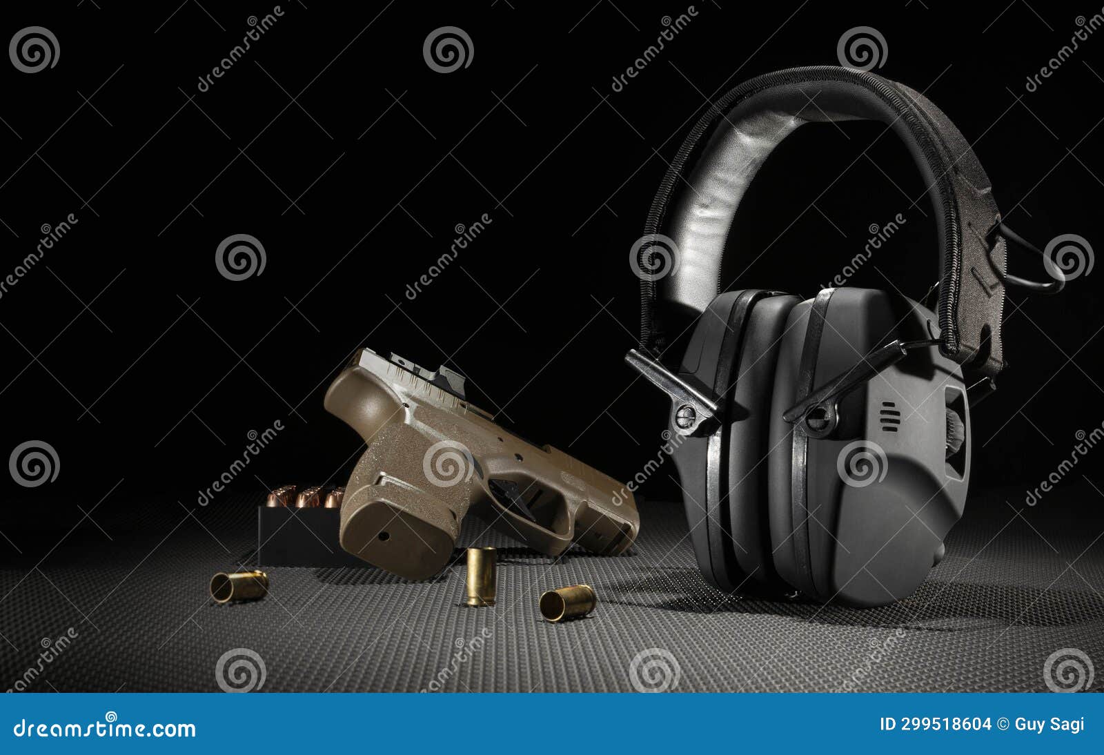 Room for Test with Electronic Hearing Protection and Gun Stock Photo