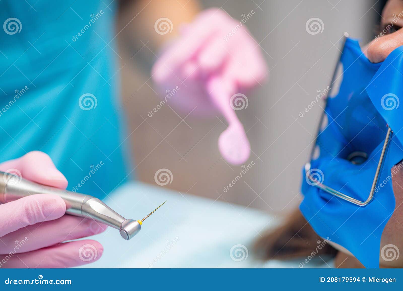 Root Canal Treatment. an Endodontist Preparing Patient for Root Canal