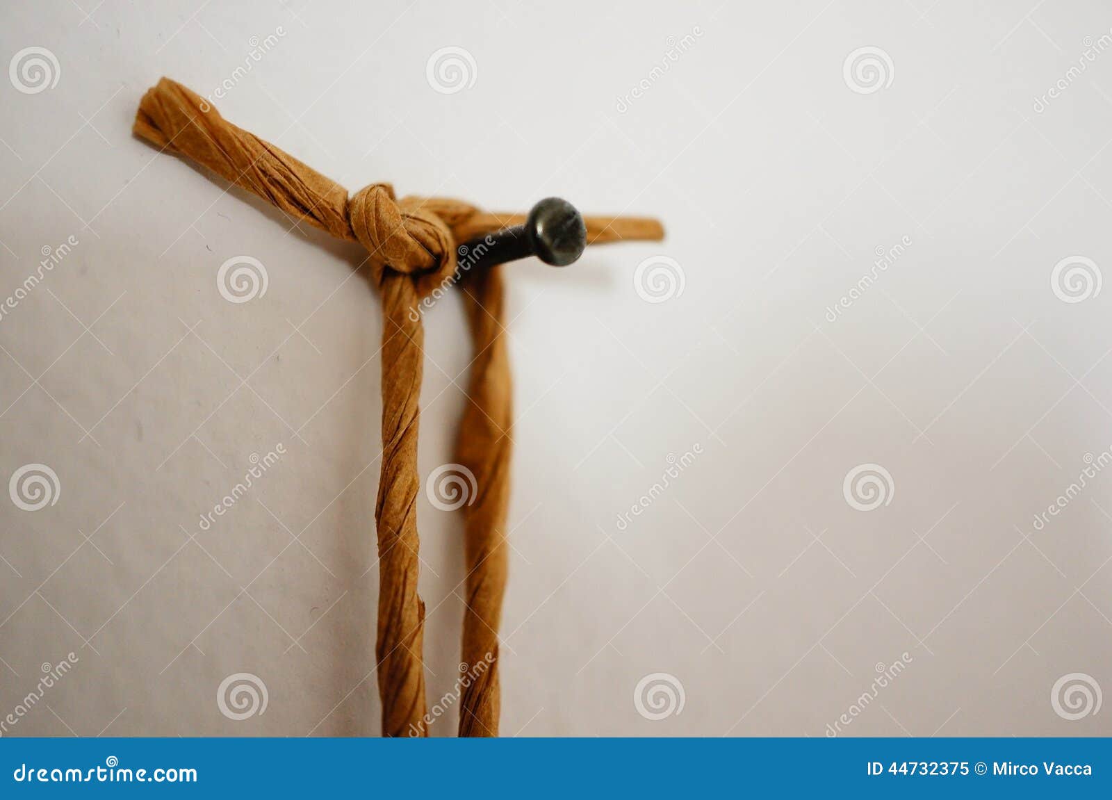 Rope on nail stock image. Image of nail, rope, hanging 44732375