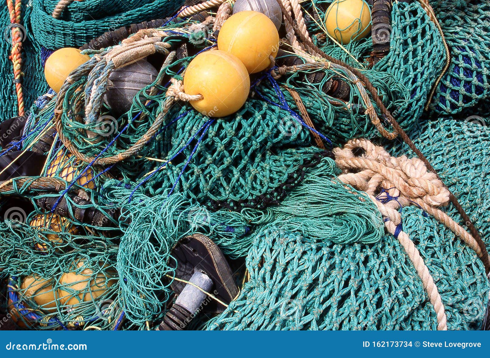 Rope and Netting of Commerical Fishing Nets Stock Photo - Image of  industrial, commercial: 162173734