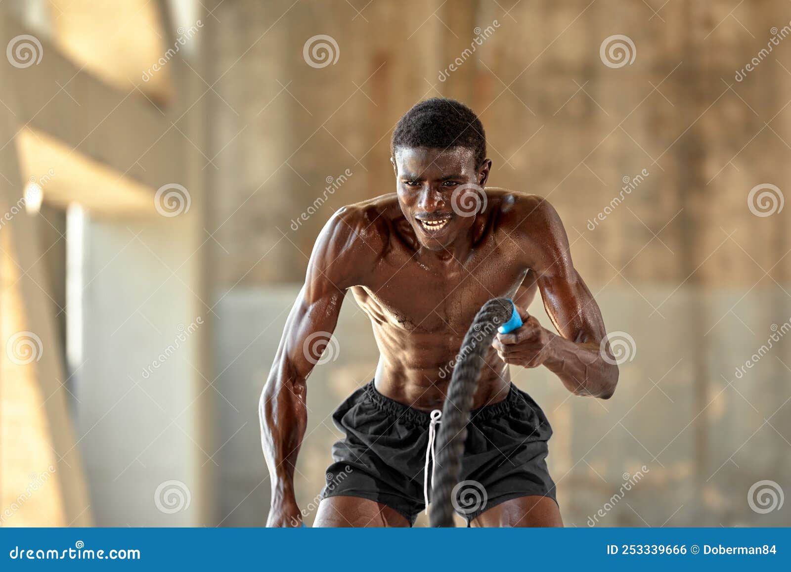 Rope Workout. Sport Man Doing Battle Ropes Exercise Outdoor Stock Photo -  Image of black, lifestyle: 253339666