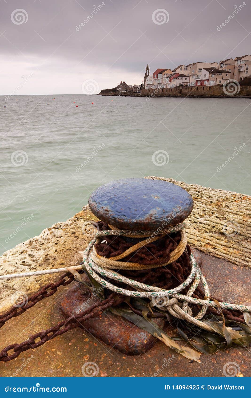 ropes around maritime bollard
