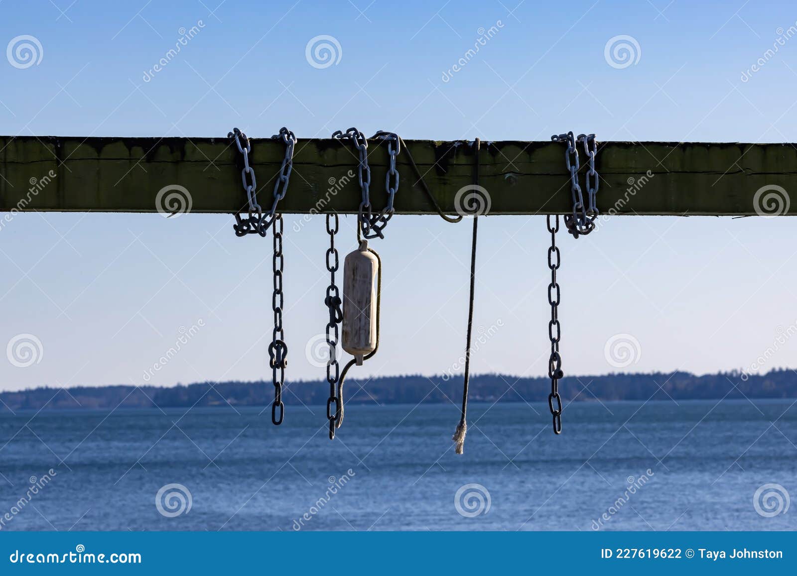 Ropes Chains and Bouys Hanging on a Wooden Beam Stock Photo - Image of  detail, lake: 227619622