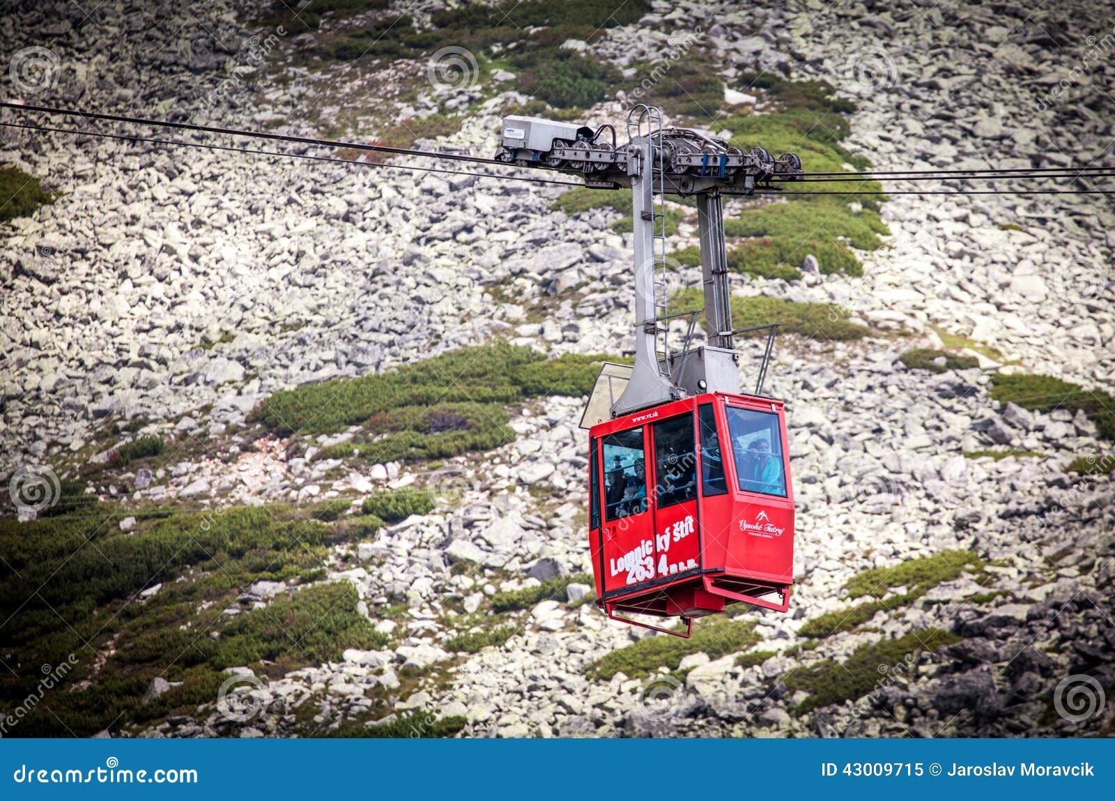 Ropeway at High Tatras, Slovakia. TATRANSKA LOMNICA, SLOVAKIA - JULY 26: Ropeway from Skalnate pleso to peak Lomnicky stit in Tatras mountains on July 26, 2014 in Tatranska Lomnica