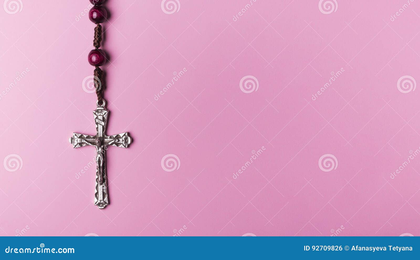 Rosary On A Pink Background. Cross. Stock Photo - Image of isolated