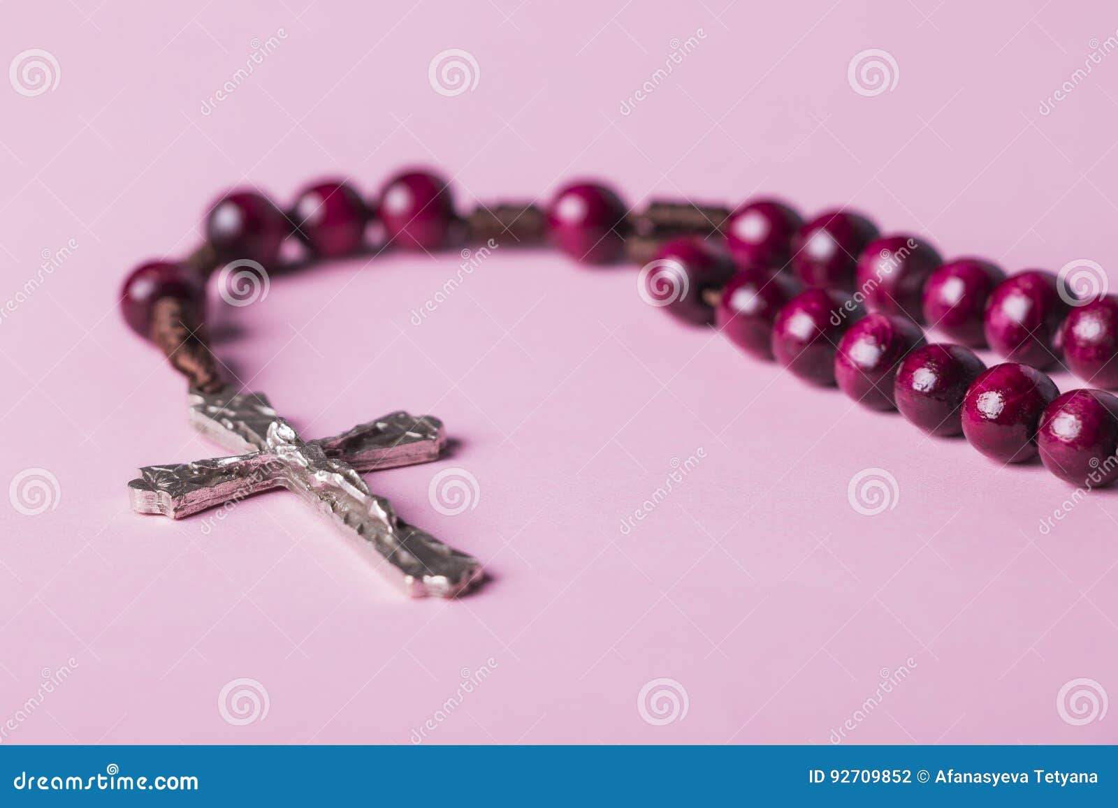 Rosary on a Pink Background. Cross. Stock Photo - Image of church