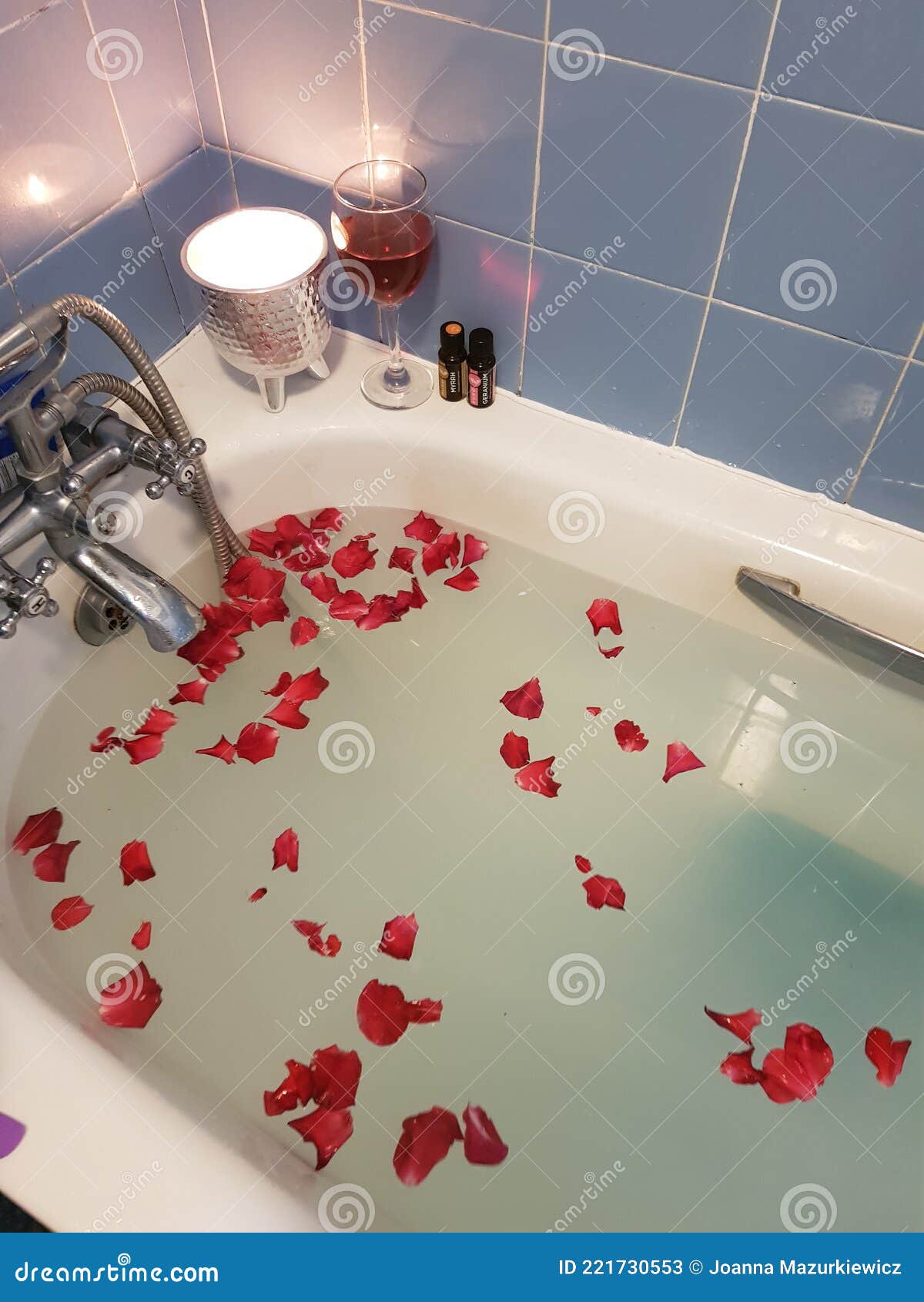 Rose petal in bath stock image. Image of flower, pink 221730553