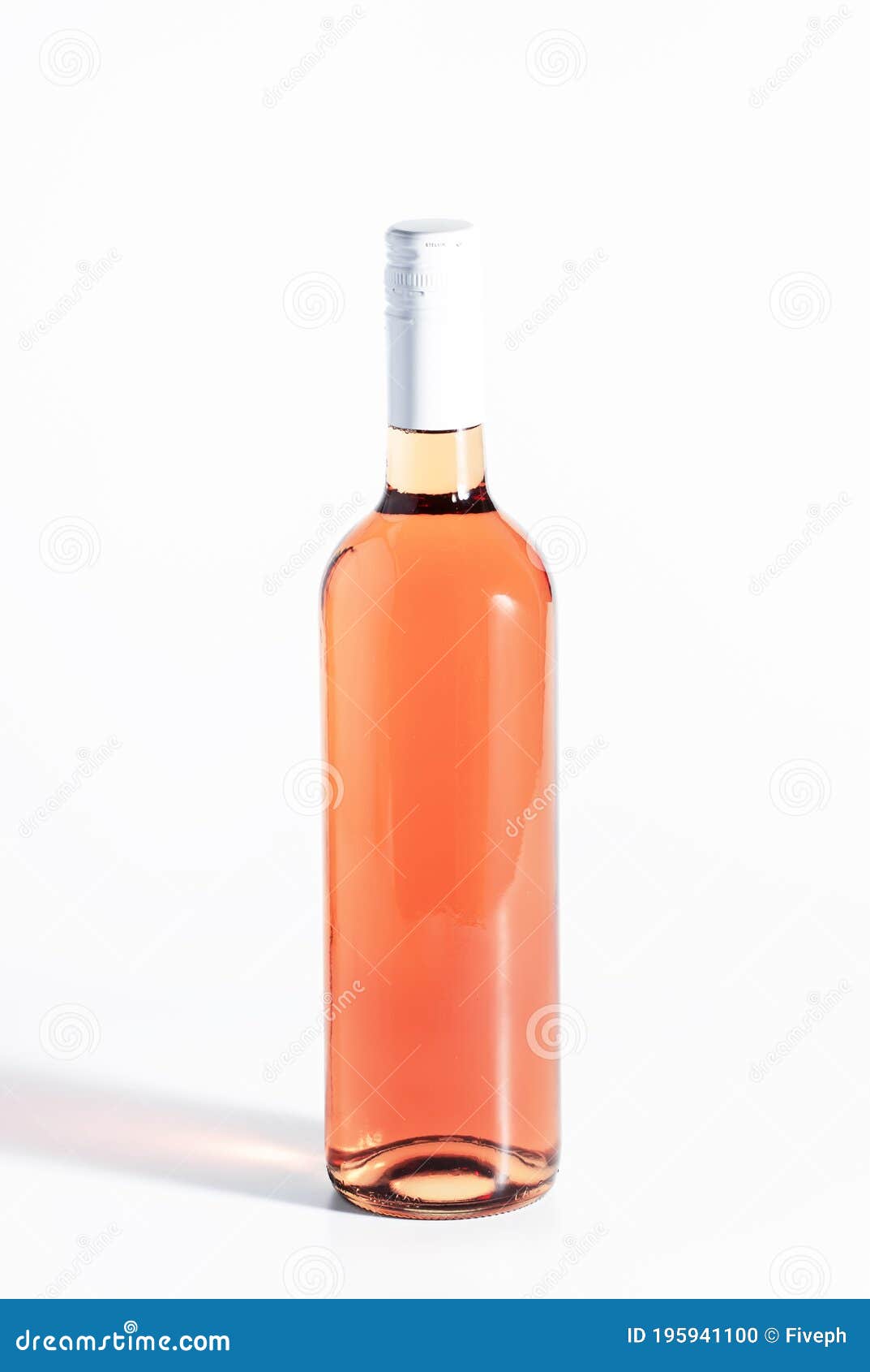 rose wine bottle on the white table. rosado, rosato or blush wine tasting in wineshop, bar concept. copy space