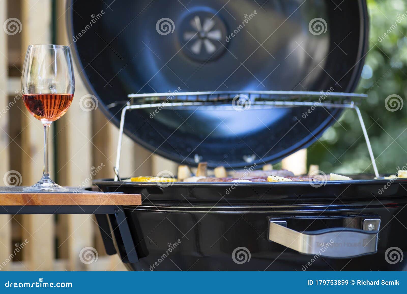 Rose wine and garden grill stock image. Image of grill 179753899