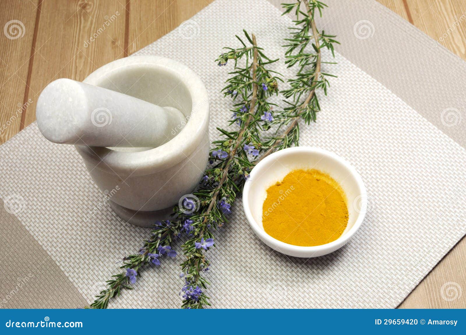 Rosemary Herb and Turmeric Spice with Mortar and Pestle Stock Photo