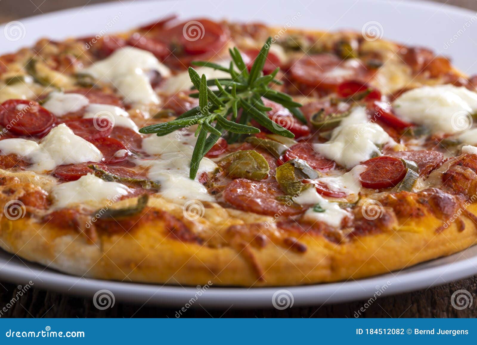 Rosemary on a pizza stock photo. Image of parmesan, meal 184512082