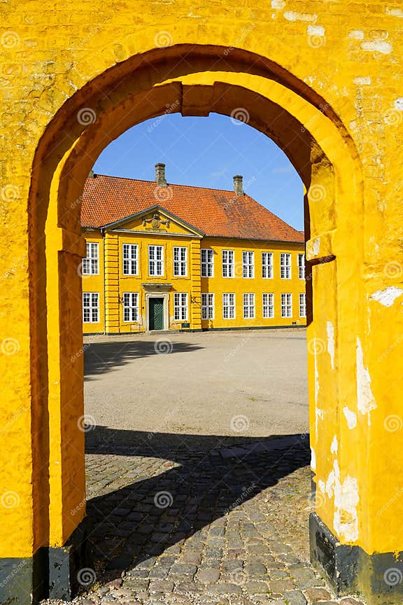 Roskilde Denmark May 28 2023: View through Arch To Royal Palace in Roskilde Denmark May 28 2023: View through Arch To Royal Palace in