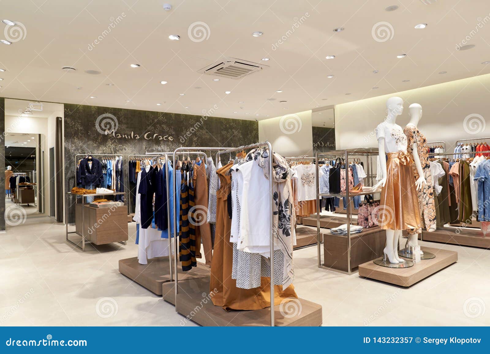 Interior of Women`s Clothing Store in the Mall Editorial Photography ...