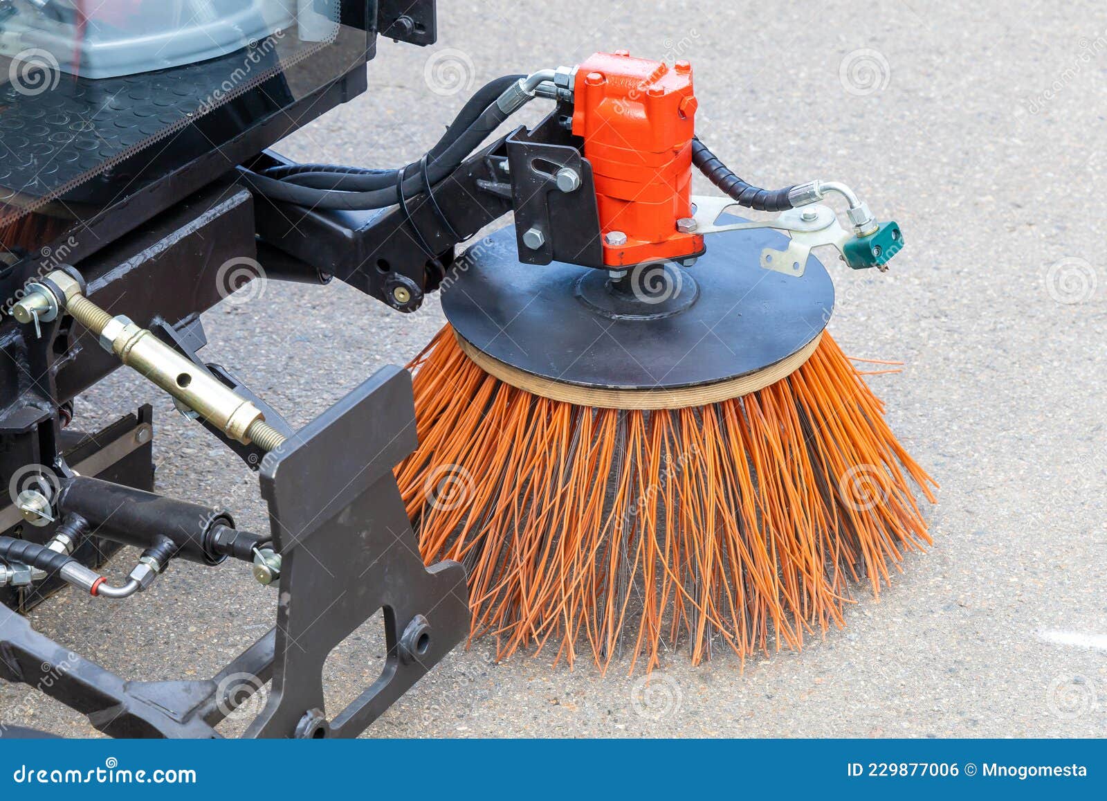 Rotating Brushes of a Compact Municipal Sweeper for Cleaning Narrow