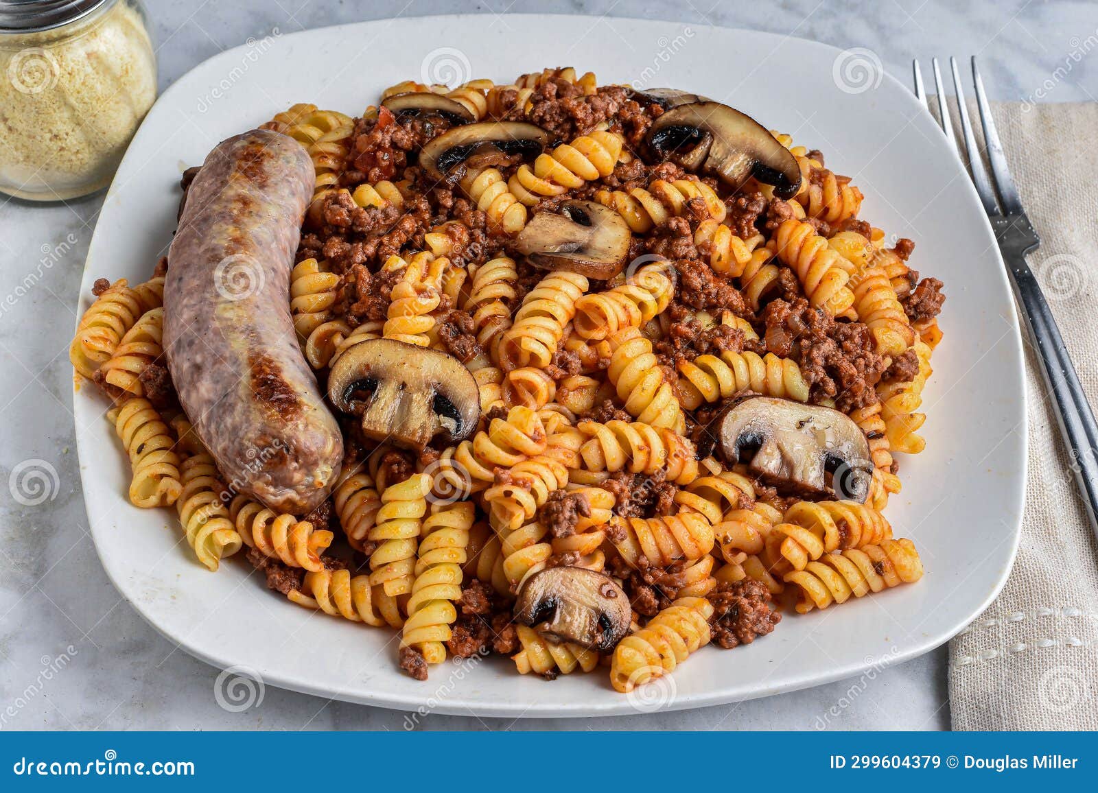 Rotini Pasta with a Meat Sauce and Mushrooms Stock Image - Image of