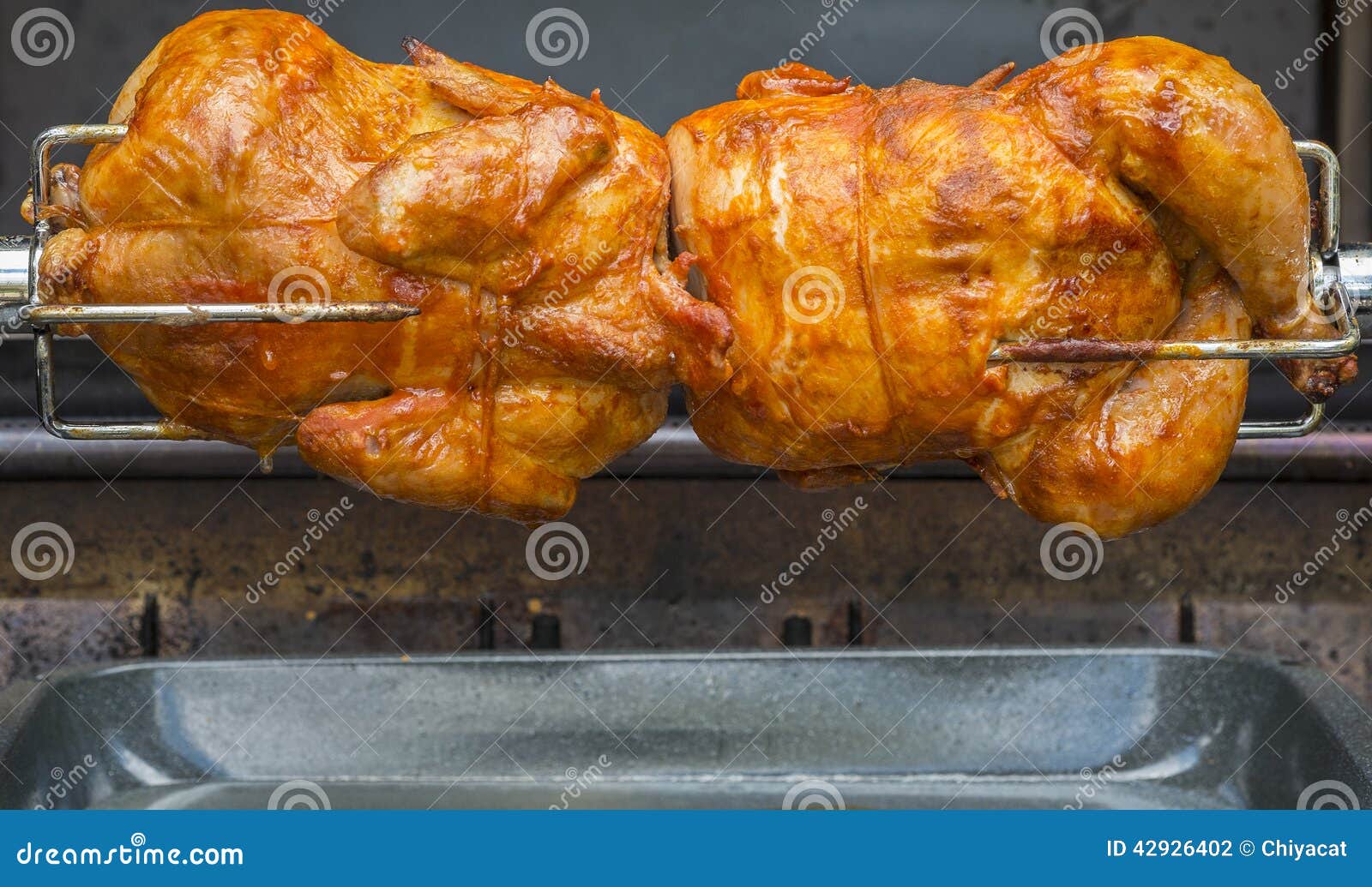 Rotisserie Chicken 1 stock photo. Image of skewer, barbecue 42926402