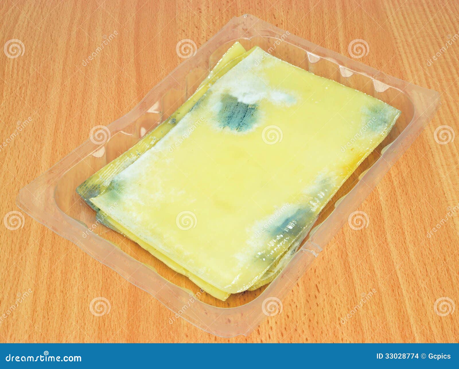 Rotten Slices of Cheese stock photo. Image of cheese 