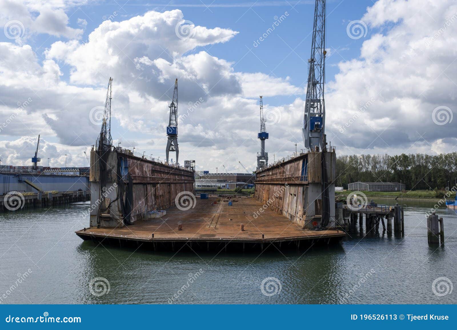 Draak hardware cruise Rotterdam, the Netherlands Eye Level View on an Empty Floating Dry Dock  with Large Cranes on the Side Stock Image - Image of crane, pier: 196526113
