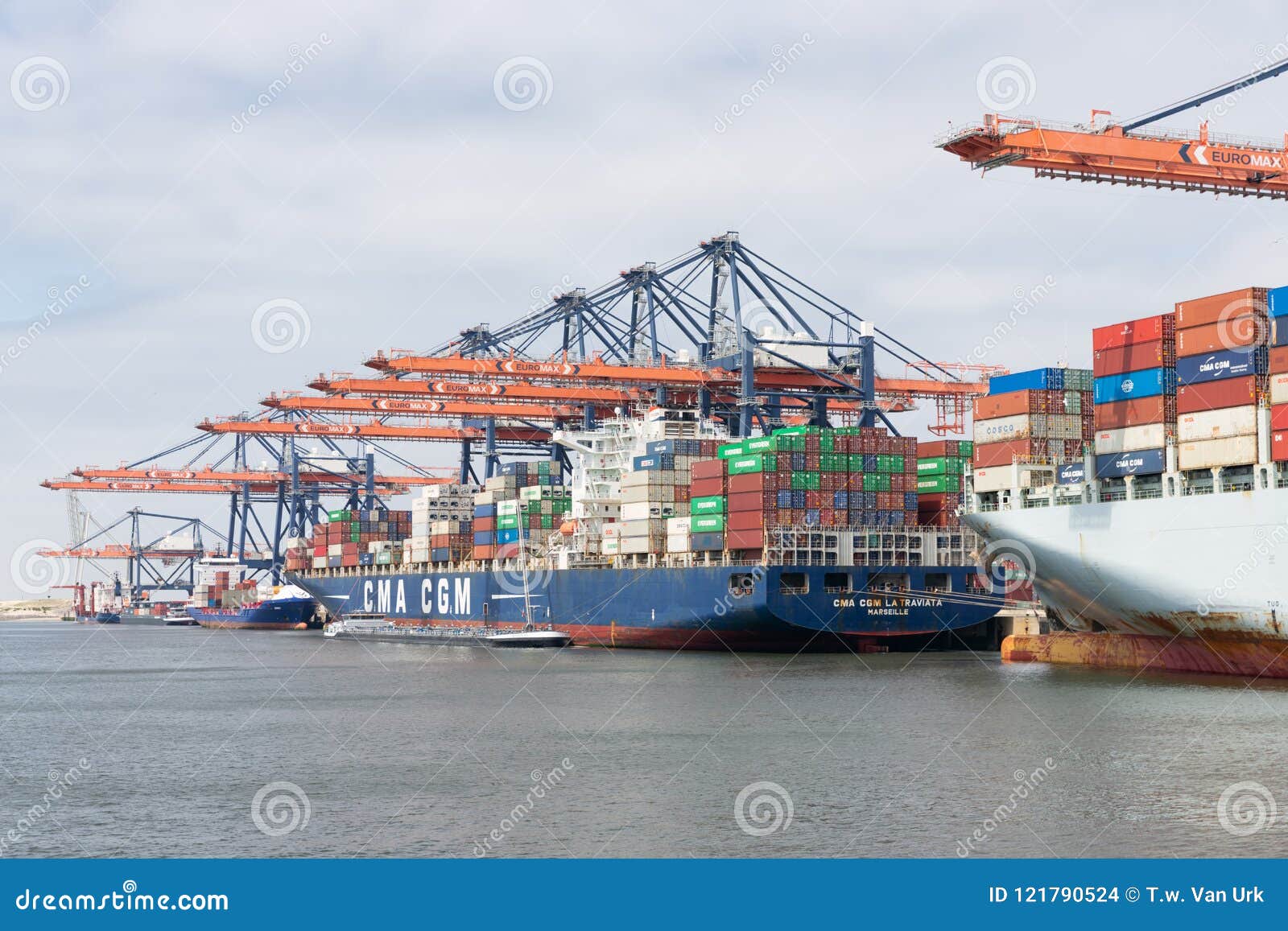 Container Terminal in Dutch Harbor Rotterdam with Cargo Ships Moored