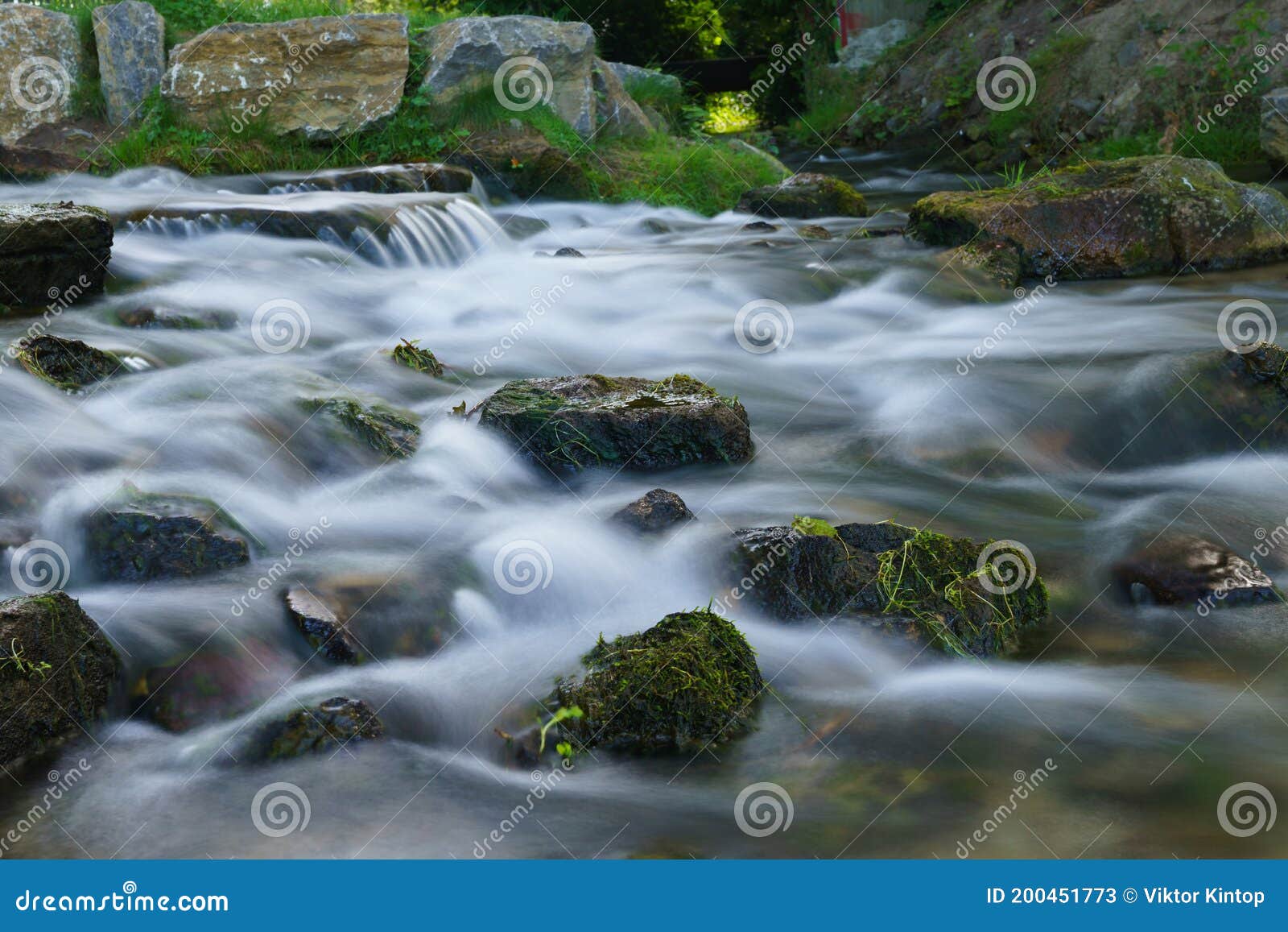 Rough River, Water Flows among Stones. Long Exposure Stock Image