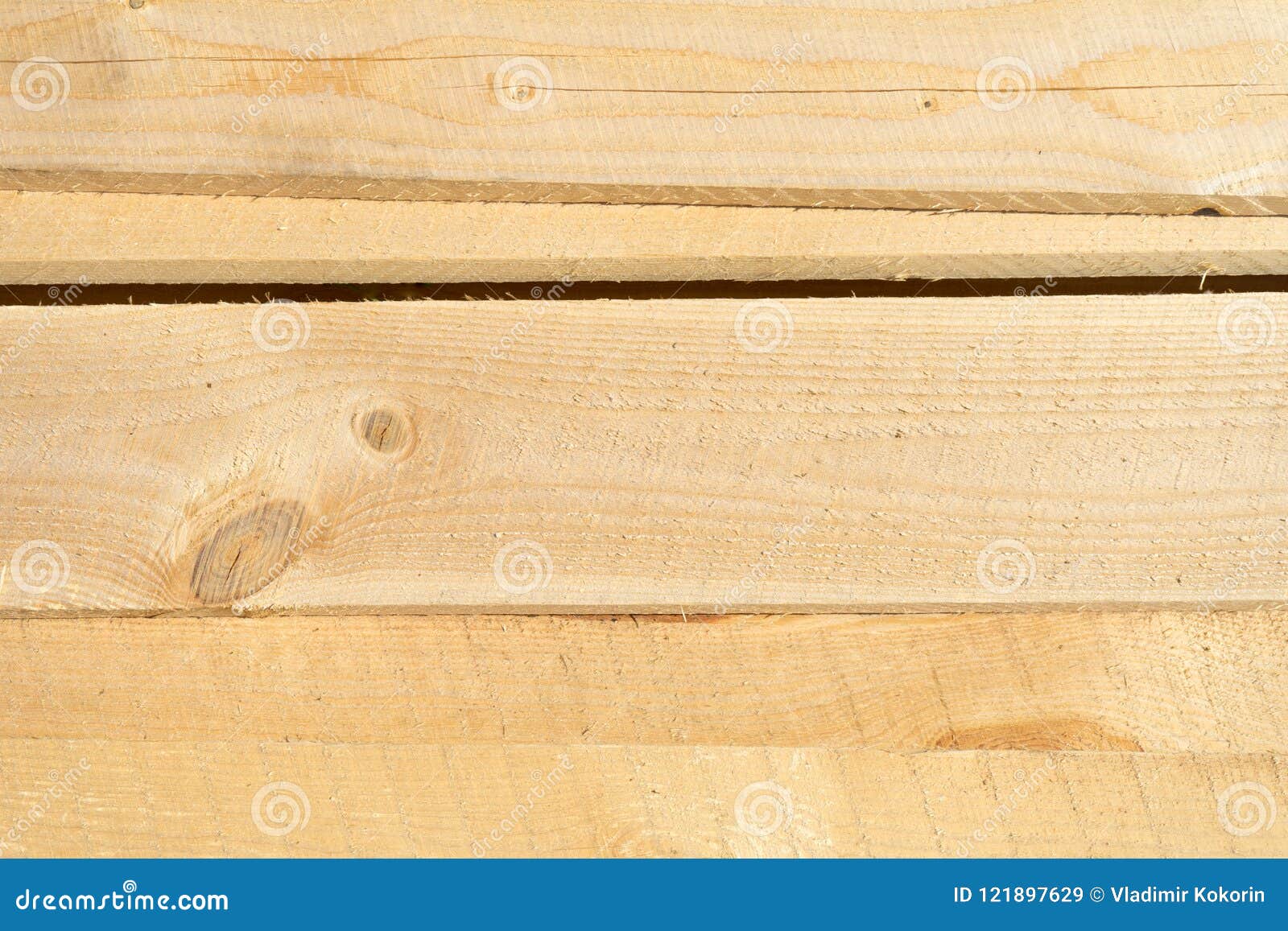 rough sawn scots pine boards stack on the construction site