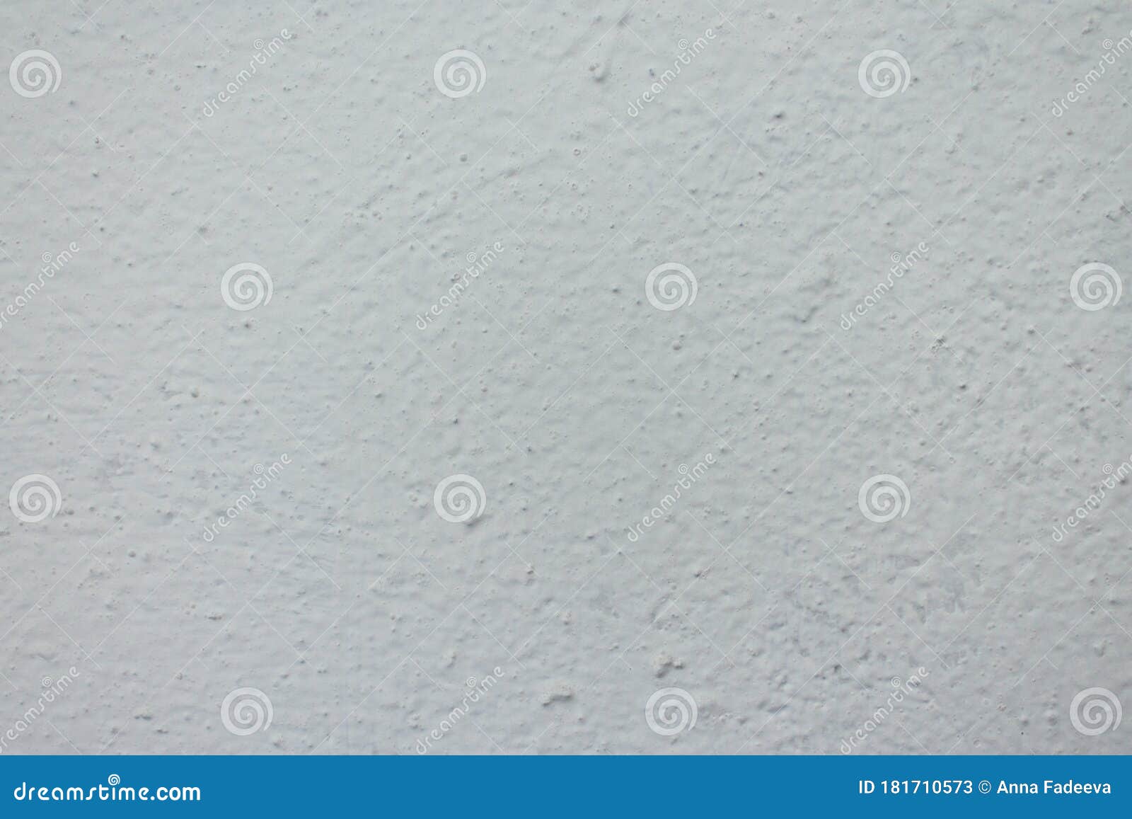 Rough White Painted Wall with Bumps Texture Background Stock Image