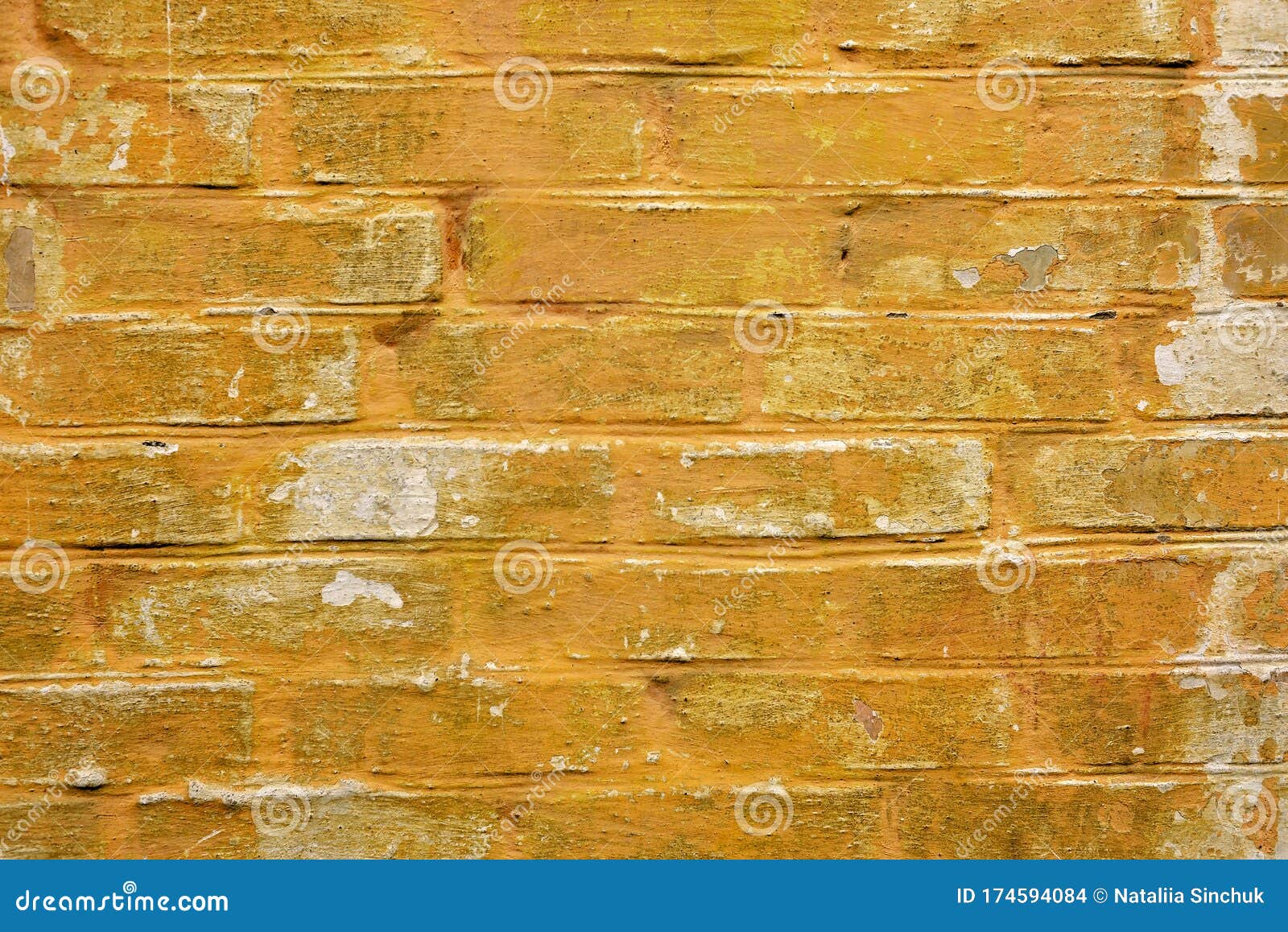 Rough Yellow Brick Wall with Peeling Paint. Texture for Background