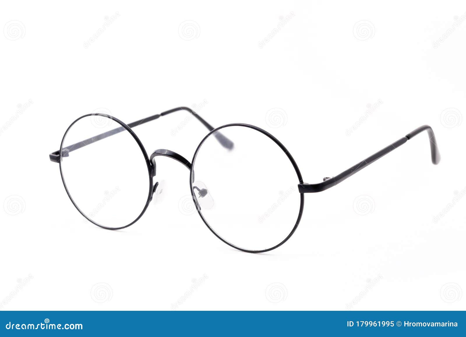 round black-rimmed glasses are view from above.  on a light background.